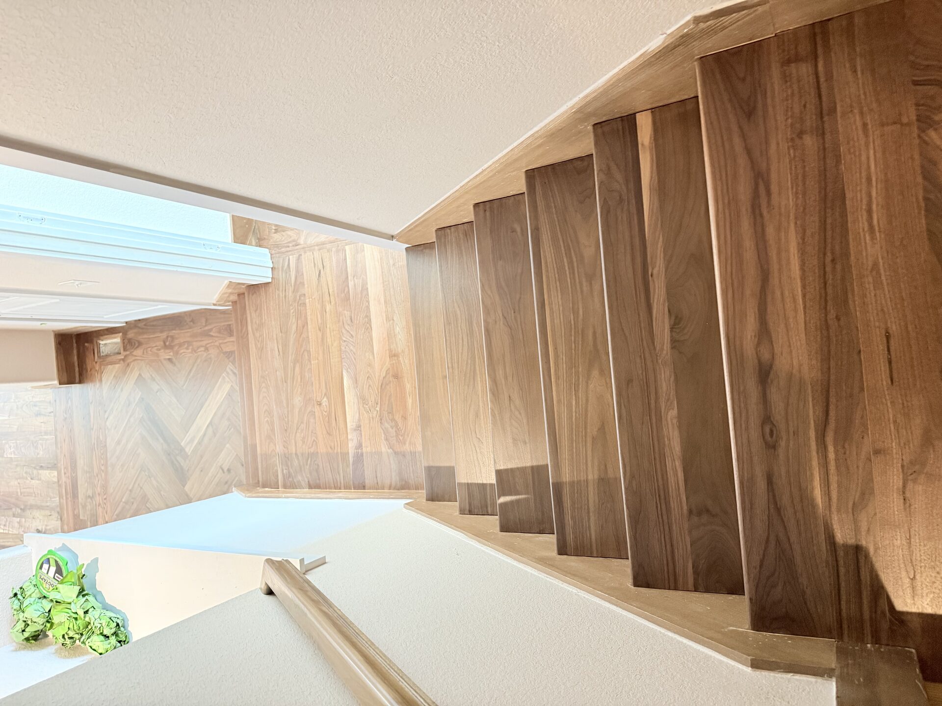 Wide plank hardwood floor installation in a Bella Vista AR luxury home