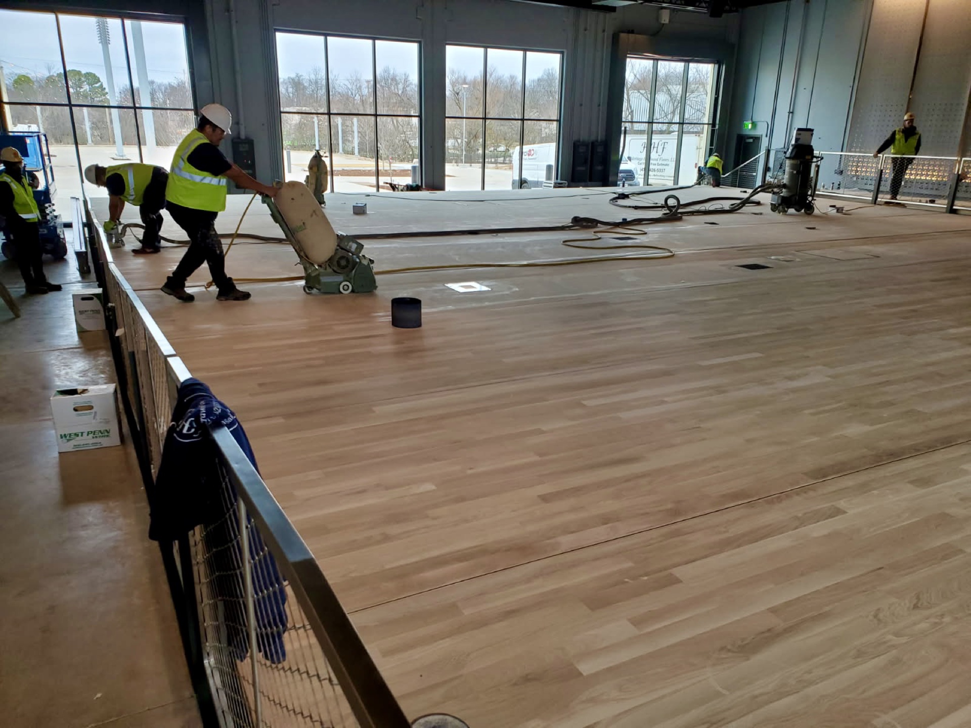 Commercial hardwood floor sanding and refinishing by Heritage Hardwood Floors in Northwest Arkansas